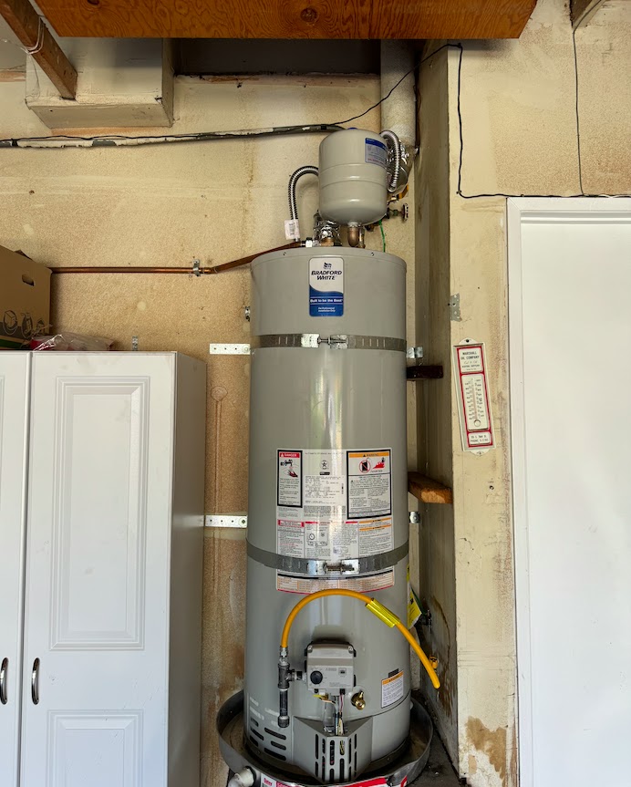Water heater replacement by Pure Planet Plumbing in a Burbank garage